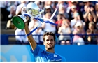 EASTBOURNE, ENGLAND - JUNE 21:  Feliciano Lopez of Spain celebrates with the trophy after winning the Men's Final between Richard Gasquet of France and Feliciano Lopez of Spain at the Aegon International at Devonshire Park on June 21, 2014 in Eastbourne, England.  (Photo by Ben Hoskins/Getty Images)